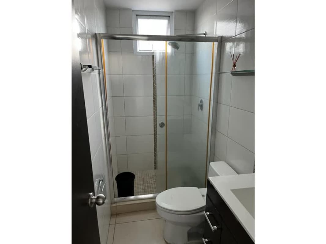 Open-air gym equipment and mini soccer court at residential PH Kings Park Panama