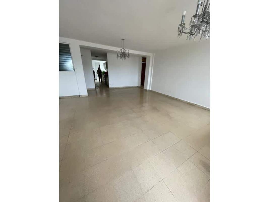 Galley kitchen with cabinetry, double sink, stove, tile backsplash in PH Hato Pintado Pueblo Nuevo