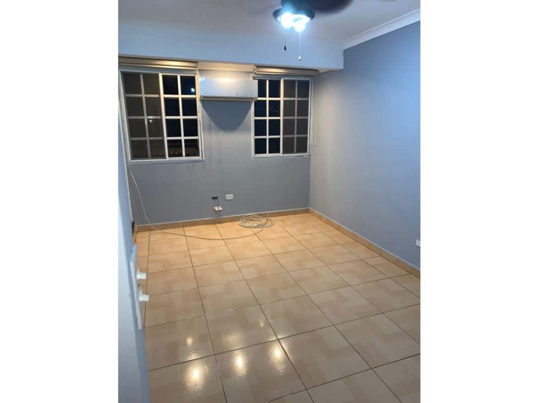 Modern kitchen with granite counters, stainless appliances and window Calle 76 Betania Panama