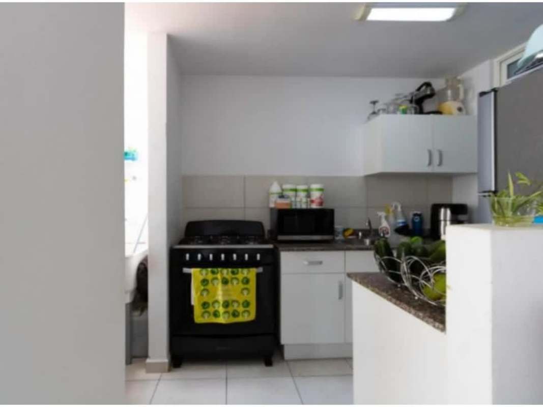 Minimalist master bedroom with blackout blinds, padded headboard, in PH Mystic Valley Panama