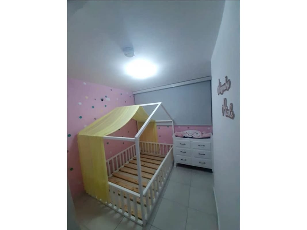 Minimalist bedroom with large window, grey and white tones in PH Mystic Valley Panama City