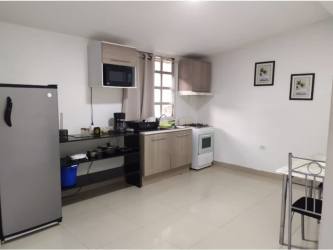 Bright living and dining area with garden view large house in Margarita Colon Panama