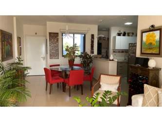 Open concept living dining room with bright windows PH Playa del Sol San Carlos Panama