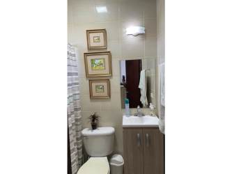 Beach condo kitchen with granite countertops and white appliances PH Playa del Sol San Carlos