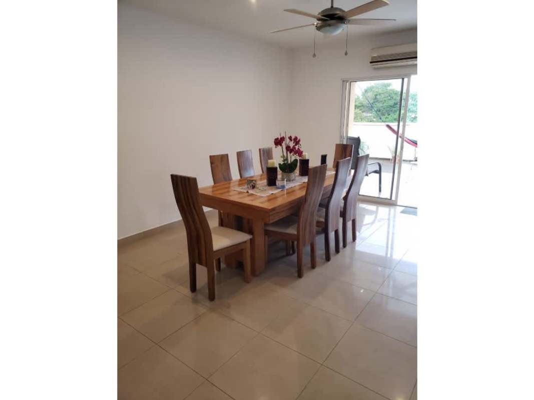 Elegant dining room with large windows in luxury penthouse PH Provenza Diablo Albrook Panama City