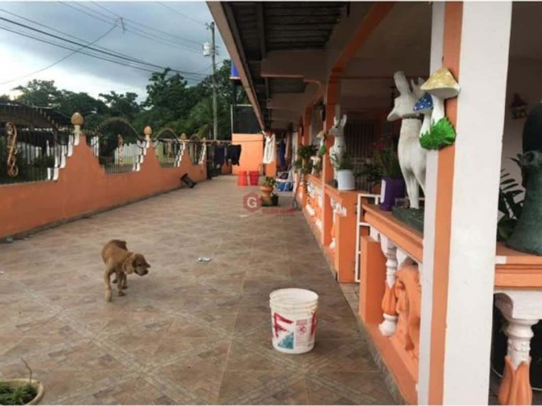 Traditional house with peach fence, metal gate, garden yard Villa Nueva Las Cumbres Panama