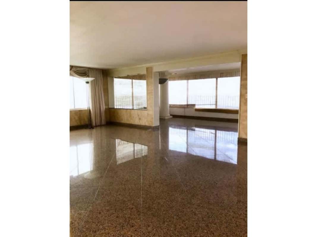 Luxury bathroom with marble, double vanity and oceanfront windows in PH Sobre las Rocas penthouse Panama