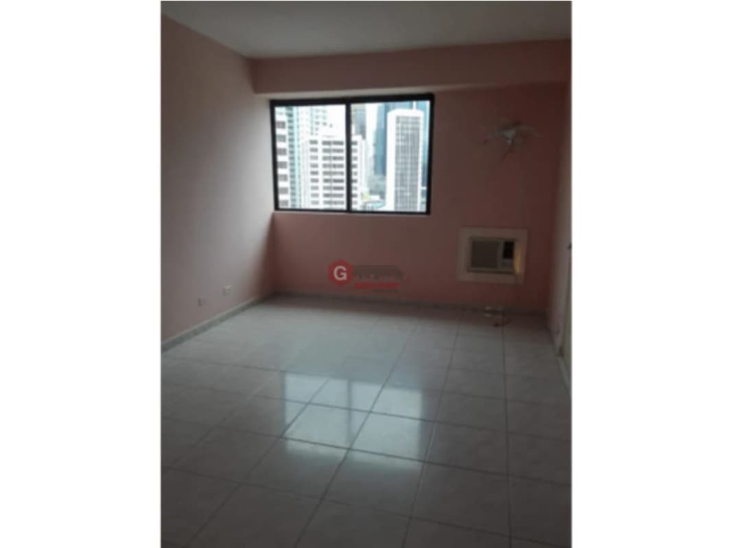 Living room large window cityscape pink walls PH Royal Center Panama City