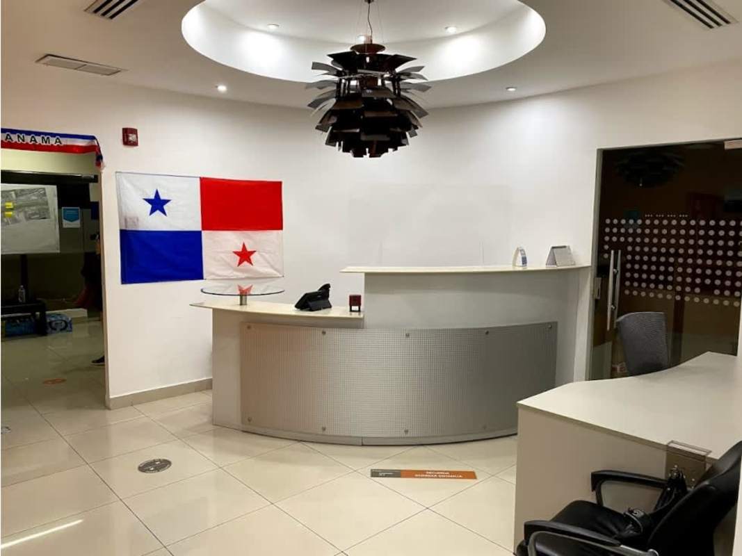 Multiple cubicles and whiteboards in modern corporate office in Punta Pacifica Panama