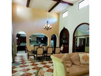 Luxury bedroom with ensuite bathroom built-in closets mountain views in Valle Escondido Boquete home