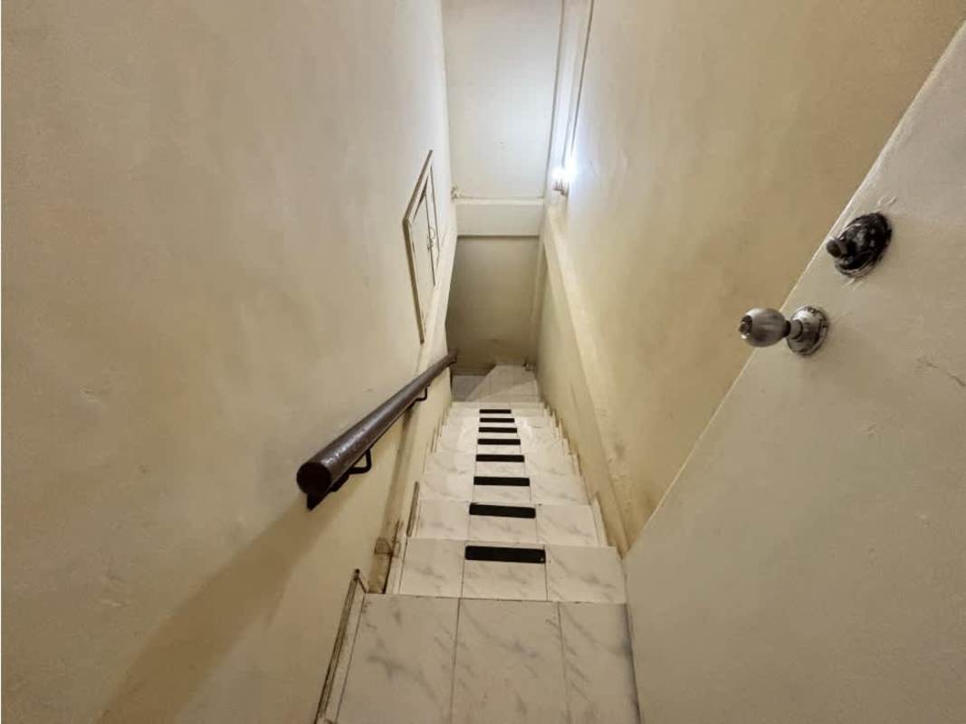 Bright living room with garden access and spacious layout in solar-powered Albrook home