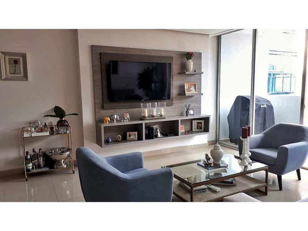 Bright living and dining area with balcony access at PH The Palm Obarrio Panama City