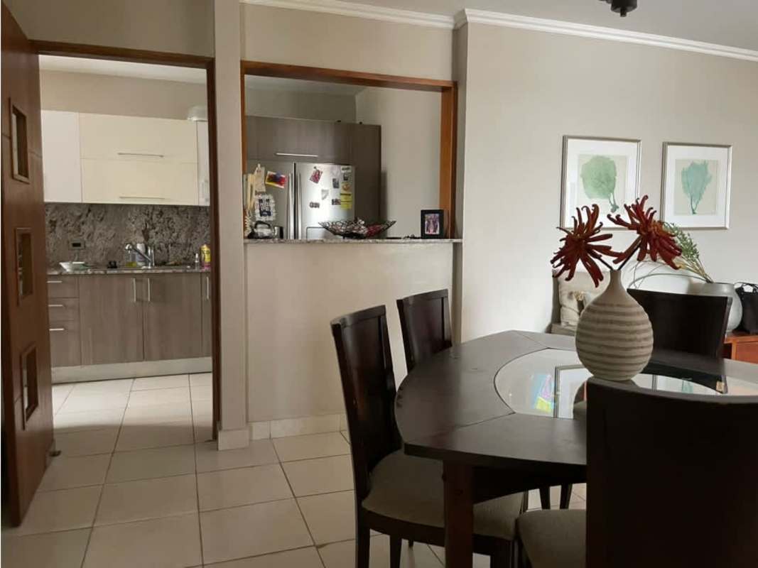 Dining room next to kitchen with modern cabinets PH Paradise Tower Hato Pintado Panama