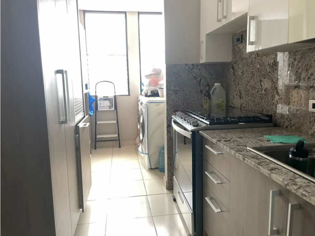 Kitchen with granite counters adjoining laundry PH Paradise Tower Panama City