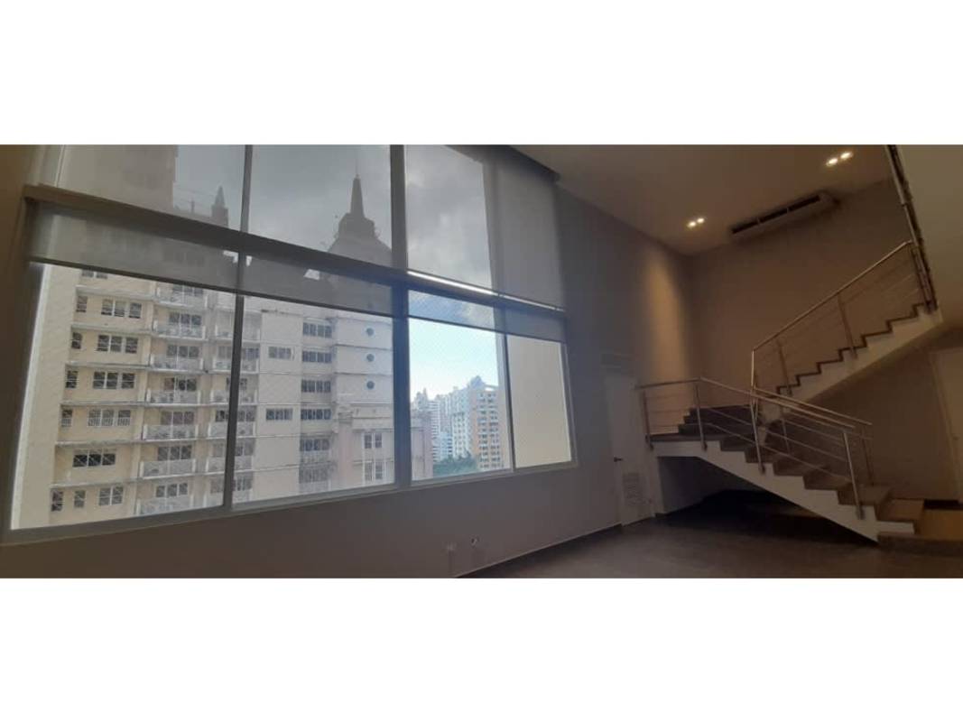 Loft style living with floor-to-ceiling windows cityscape PH Portanova Panama