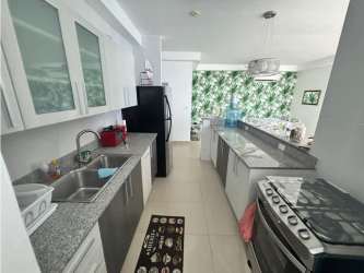 Equipped kitchen with granite counters at Playa Corona PH Patricia Italia Panama