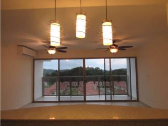 Bright bedroom with built-in closet and window views PH Midrise Woodlands Panama Pacifico