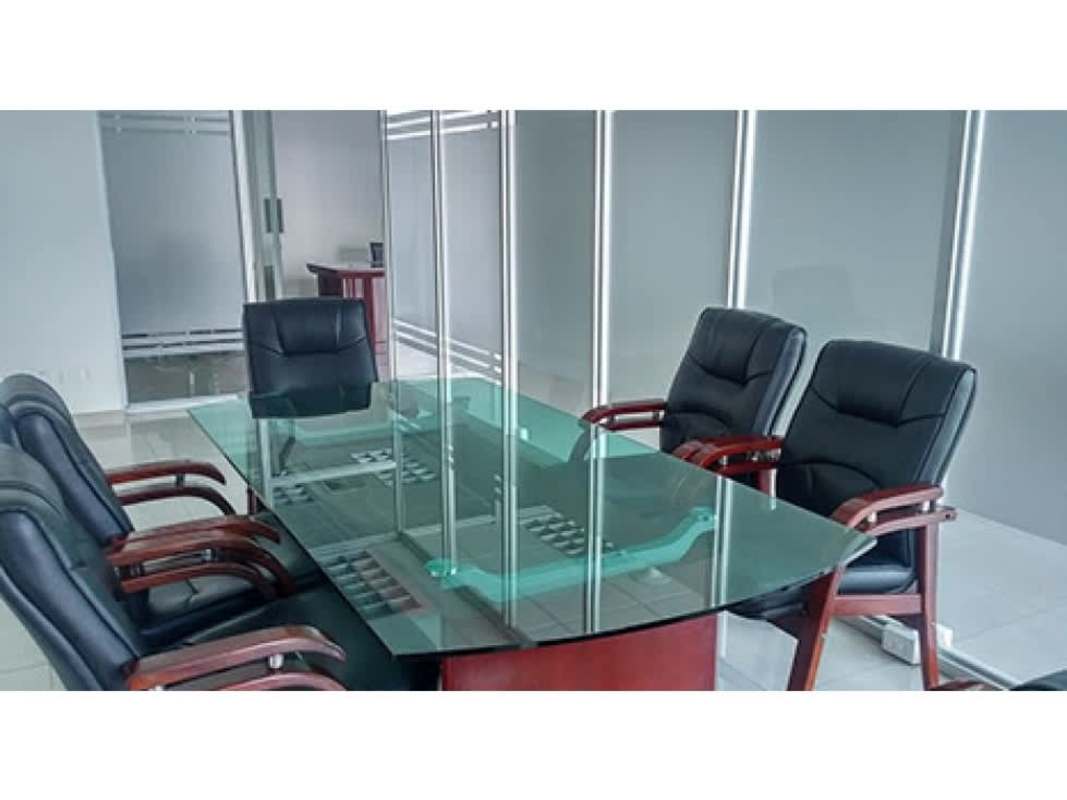 Modern conference room with glass-top table black executive chairs frosted partitions Torre Global Bank Panama