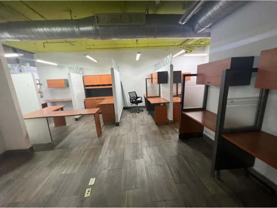 Open office layout with workstations glass partitions in PH Twist Tower