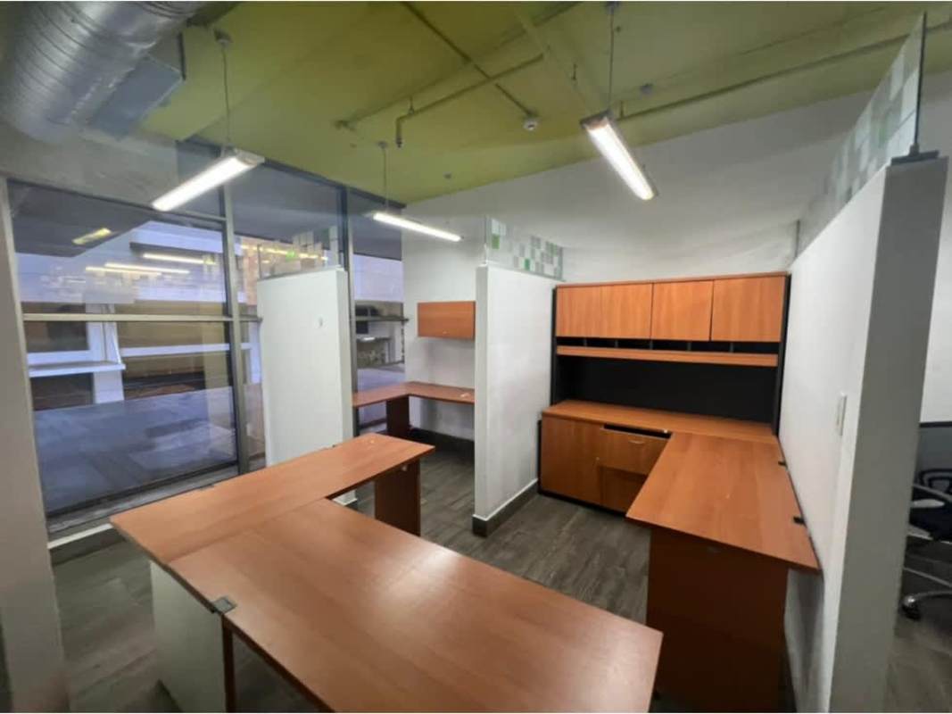 Office kitchenette with overhead cabinets and sink in PH Twist Tower Obarrio