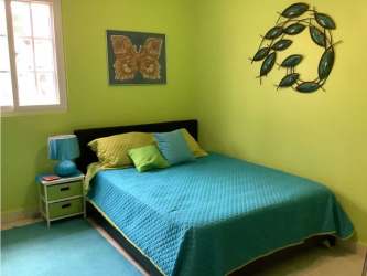 Covered terrace with ocean view ideal for outdoor dining María Chiquita beach house