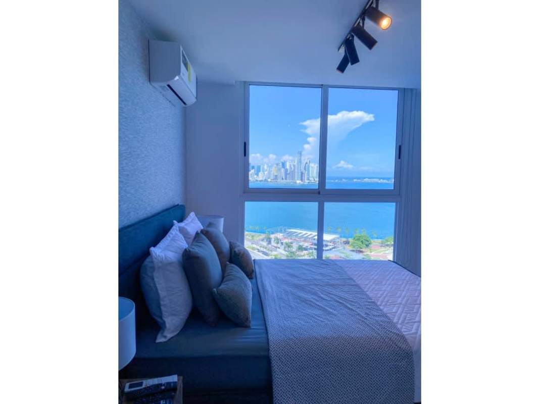 Furnished bedroom with ocean and skyline view PH The Sands Avenida Balboa