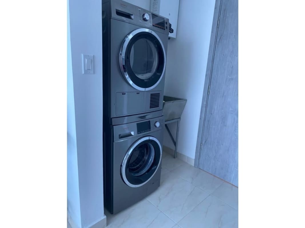 Spacious furnished living room large window oceanview PH The Sands Avenida Balboa Panama City