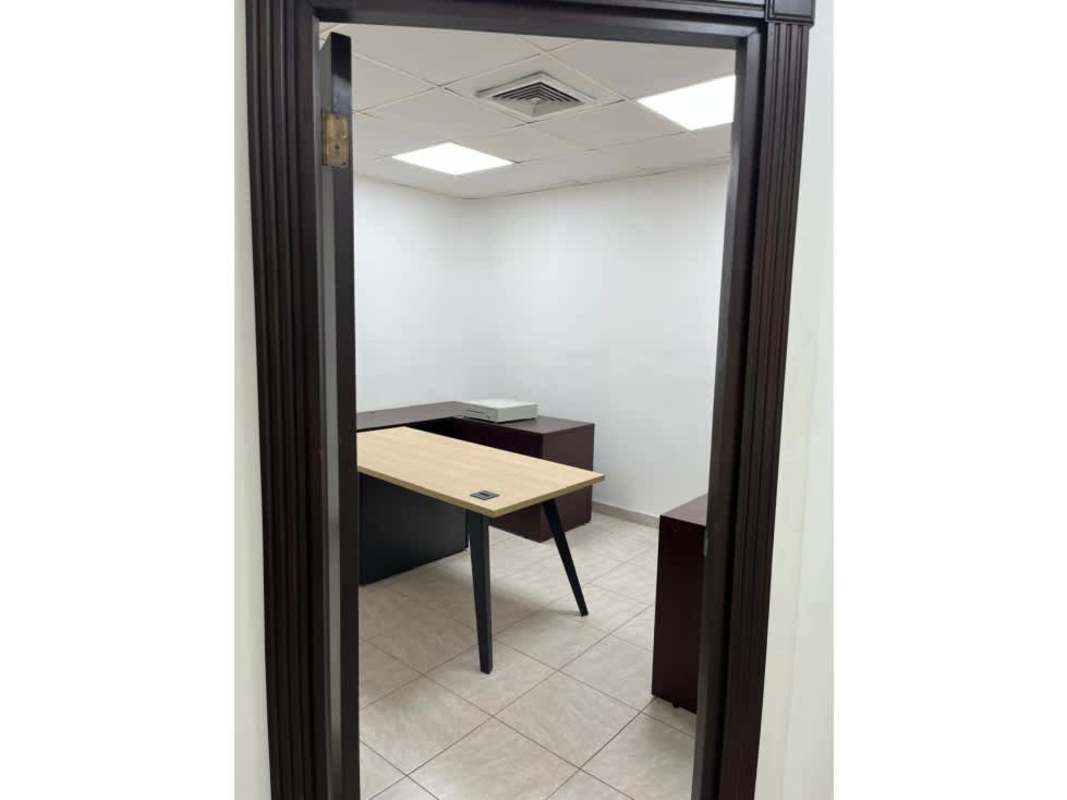 Commercial office room with large window and workspace San Francisco Panama