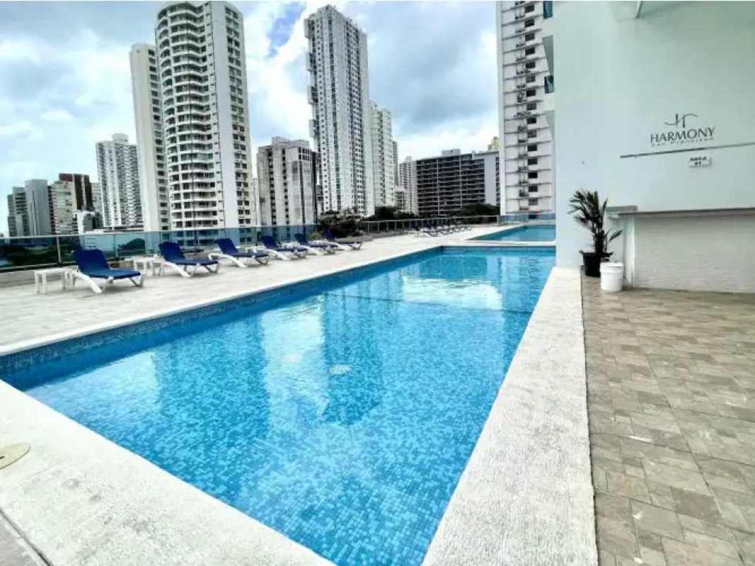 Modern pool deck with skyline view at PH Harmony Tower San Francisco Panama
