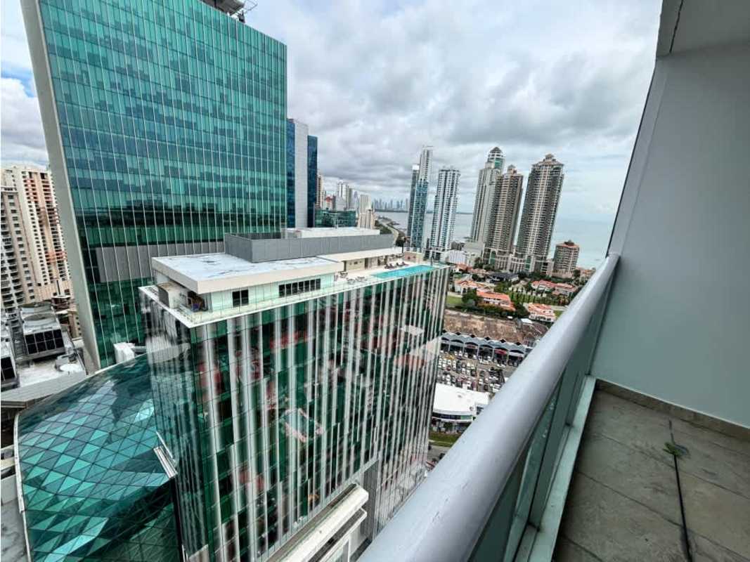 Spacious balcony with glass railing overlooking the Pacific Ocean and skyline from PH Pacific Sea Tower Punta Paitilla