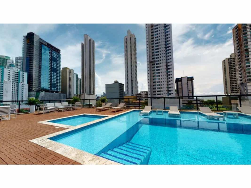 Infinity-edge pool with jacuzzi overlooking skyline at PH Balboa Bay