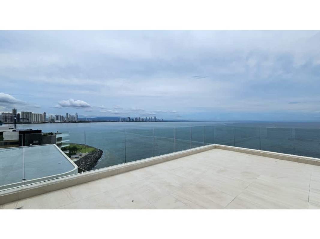 Spacious open living area with marble floors overlooking Pacific Ocean PH Ocean Pearl