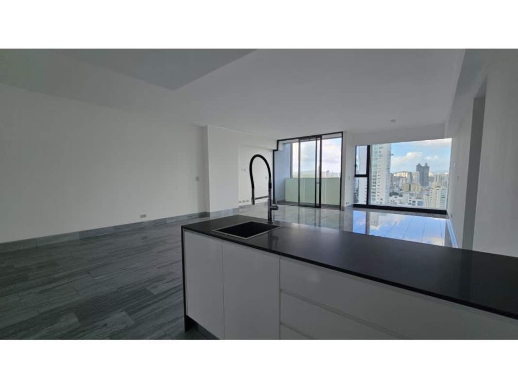 Spacious open-plan living room with kitchen island and balcony panoramic view Nuovo Armani