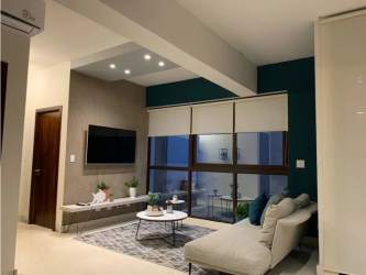 Open-plan living room fully furnished with sea views at Mareas Beach Club Panama