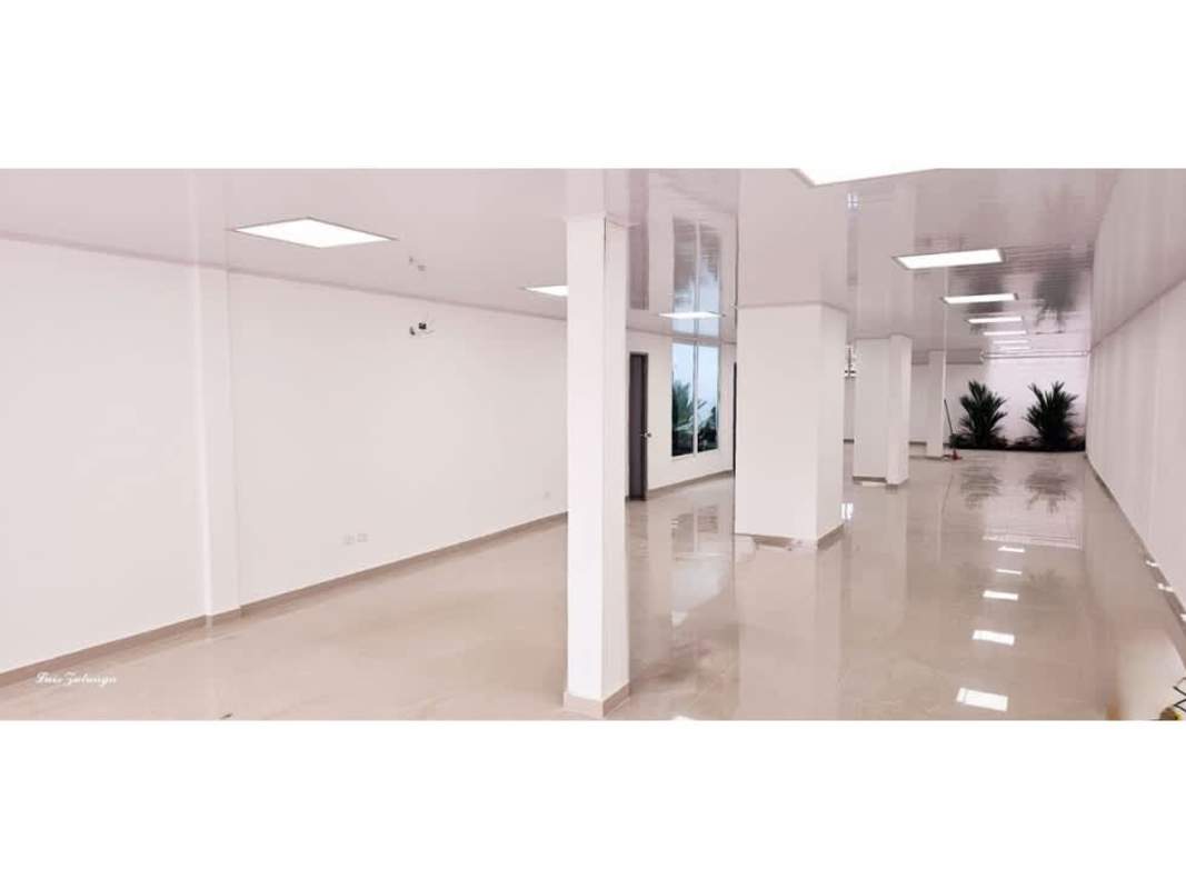 Two-story commercial building with glass entrances and parking on Avenida Santa Elena Parque Lefevre Panama