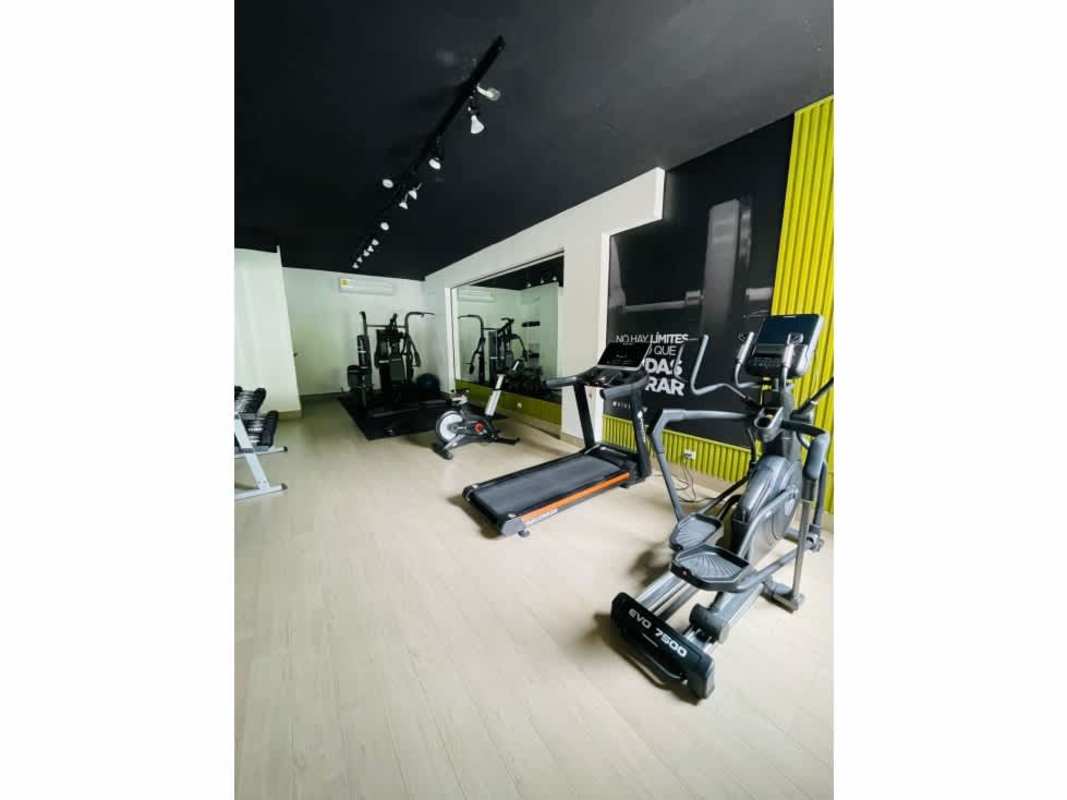 Fully equipped fitness gym with cardio and strength equipment at PH LOV San Francisco Panama