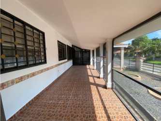 Covered terrace with tile details and enclosure in Howard Estate Panama