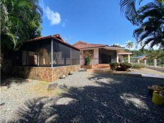 Functional kitchen with wood cabinets and tile counters Howard Panama
