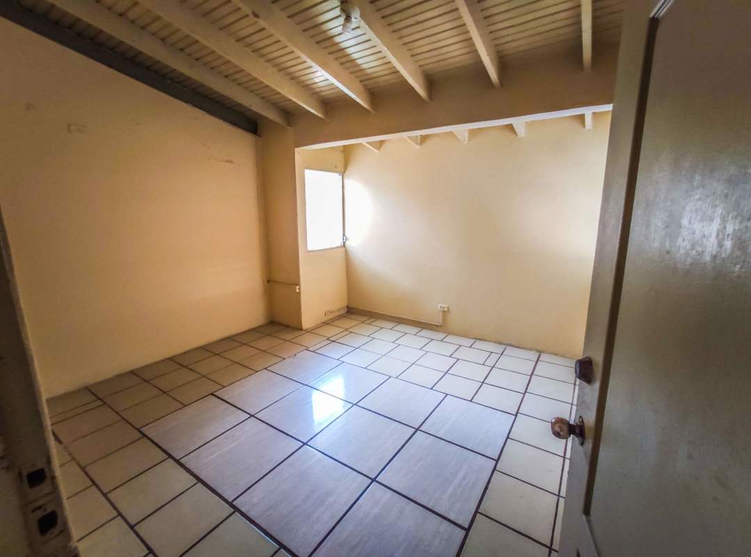 Spacious bedroom with built-in closet, tile floor in Betania home for sale Panama