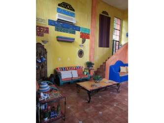 Two-level swimming pool with lush greenery and sun patio María Chiquita Colón Panama