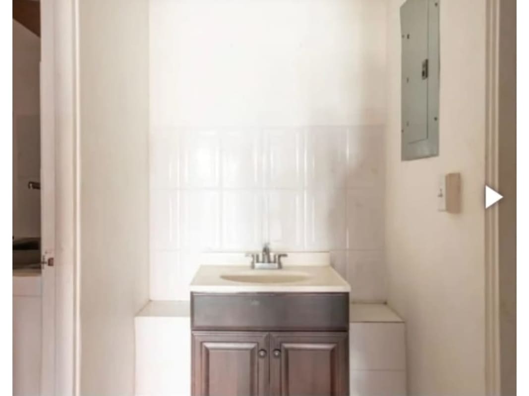 Modern shopping center Centennial Plaza with signage, balcony and parking Panama City