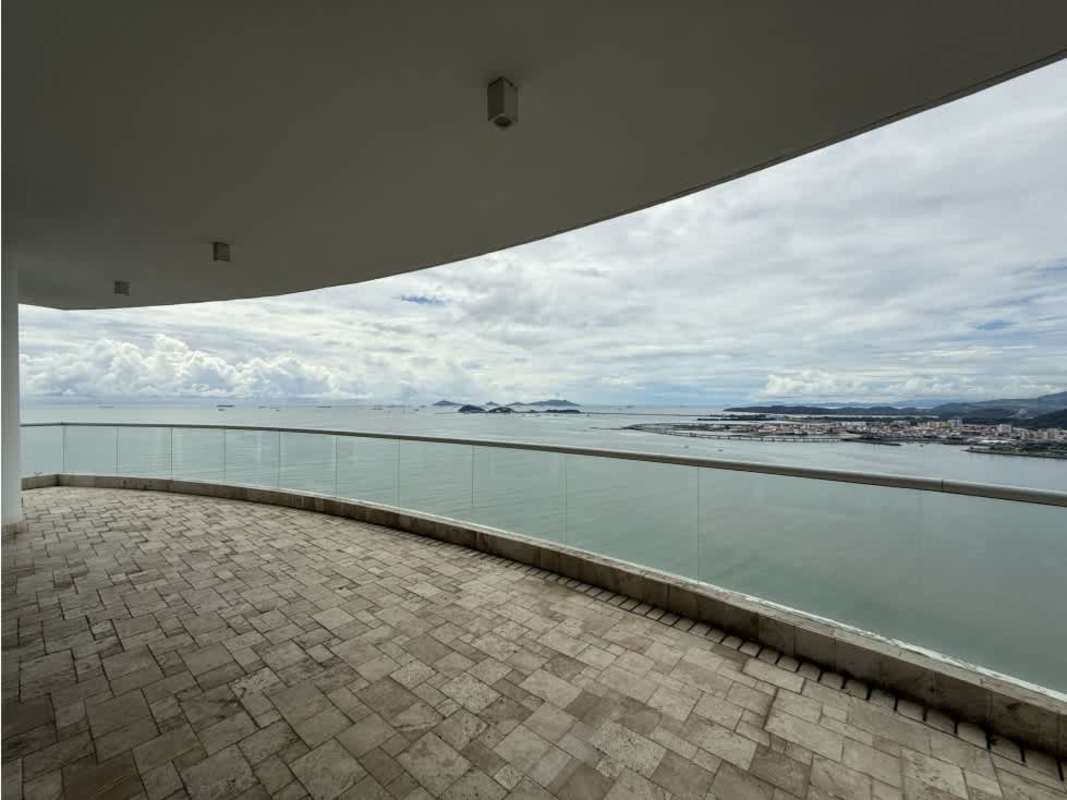 Gourmet kitchen with granite countertops, wooden cabinetry and ocean views in PH The Point Punta Paitilla.