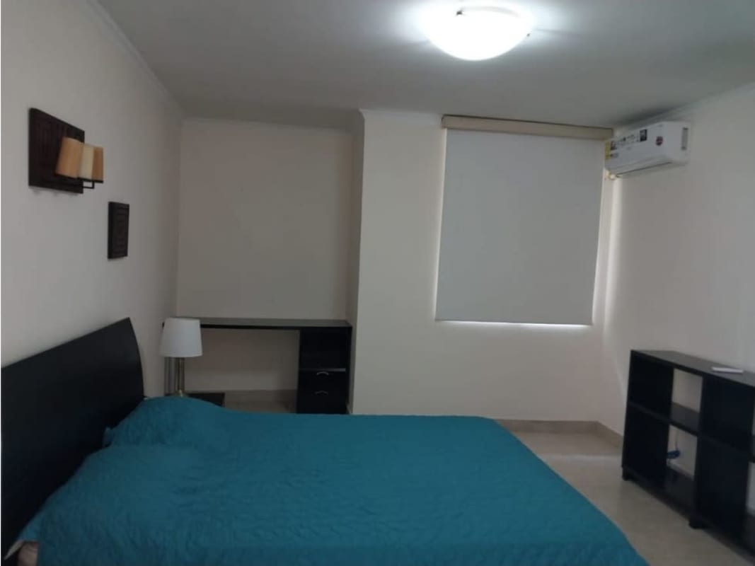 Spacious balcony in Sunrise Tower Obarrio overlooking Panama City skyline, outdoor bar counter