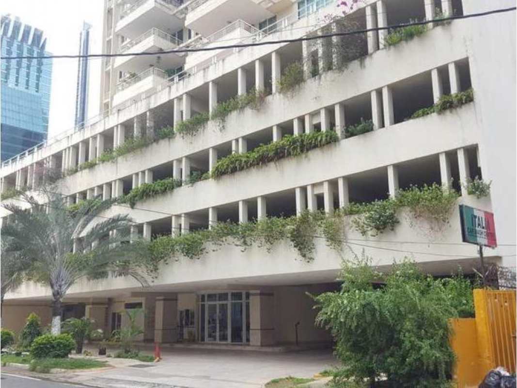 Multi-story condominium building PH Sunrise Tower with balconies and greenery Obarrio Panama City