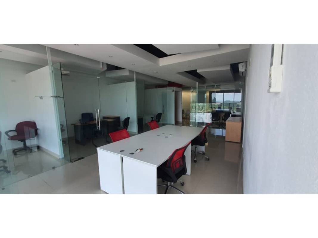 Private glass partition office with desk and chairs at Edison Corporate Center Edison Park Panama