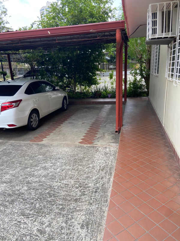 Covered parking area with garden edges in Centro Comercial Via Brasil Obarrio Panama