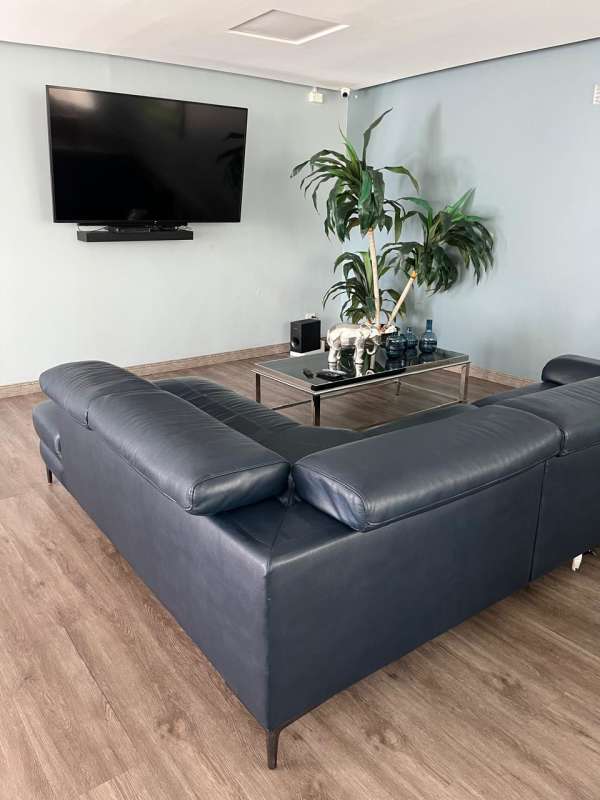 Elegant double-height lobby entrance with seating at PH Waterview San Francisco Panama