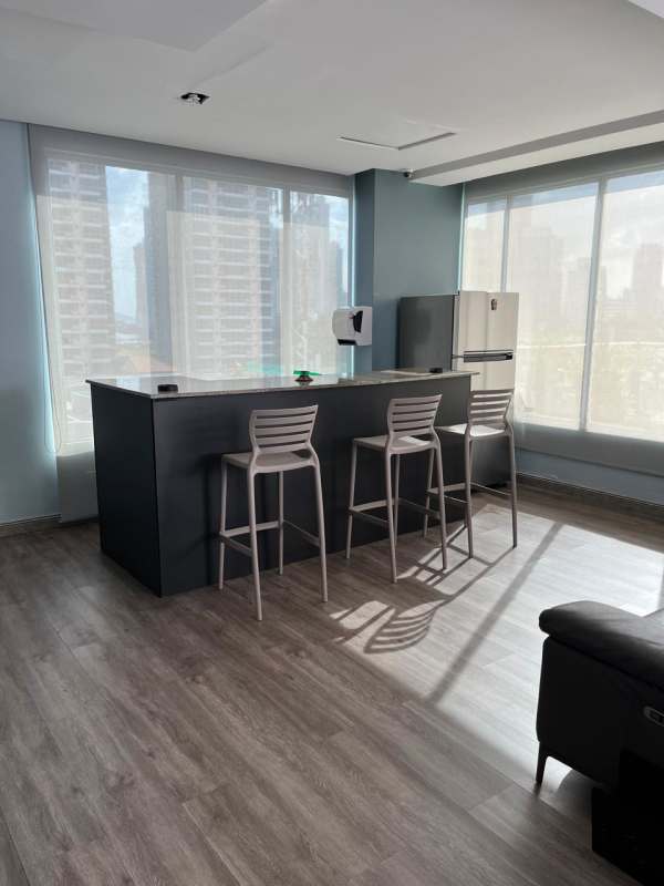 Modern enclosed kitchen with granite counters, ample cabinets in PH Waterview Panama City