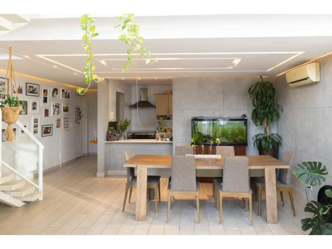 Covered balcony with skyline views in Bella Vista PH Blue Park apartment