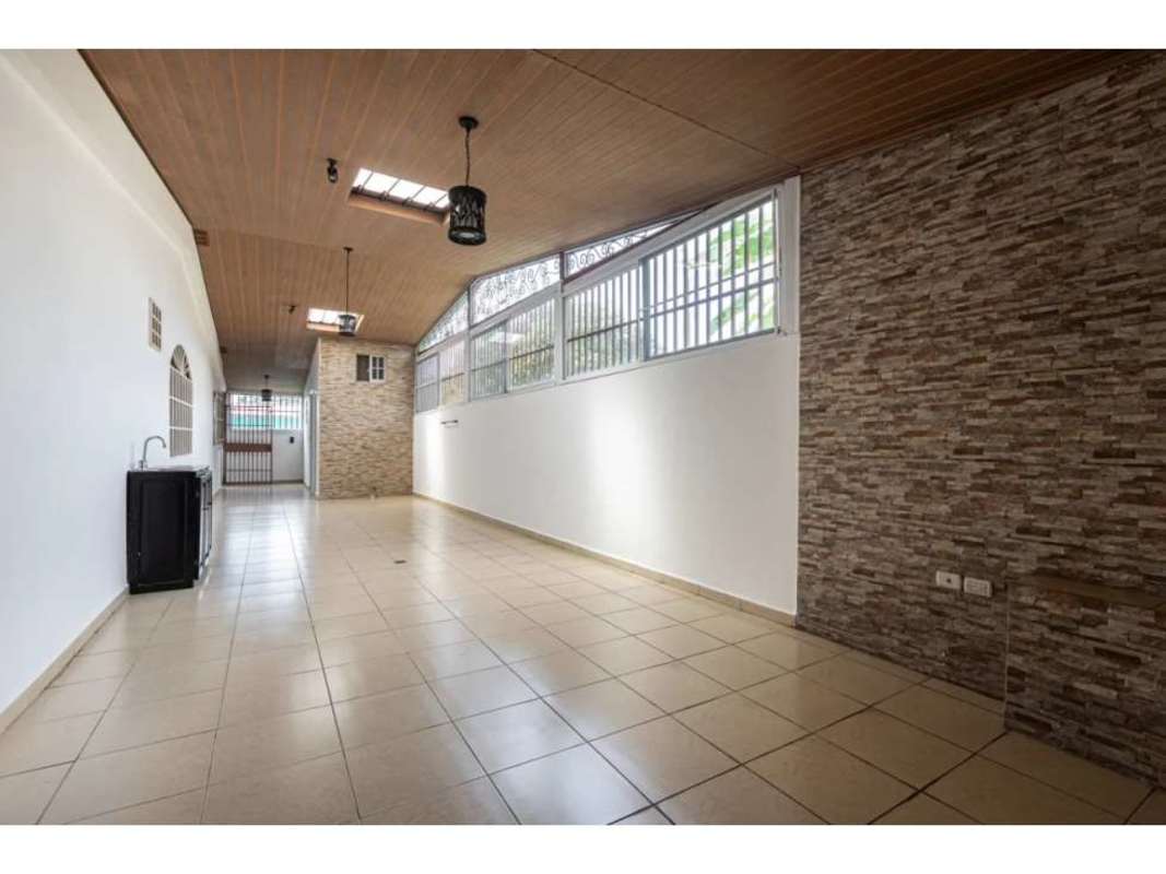 Elegant dining room with natural light, tile floor, traditional furniture in Villa Rica Panama